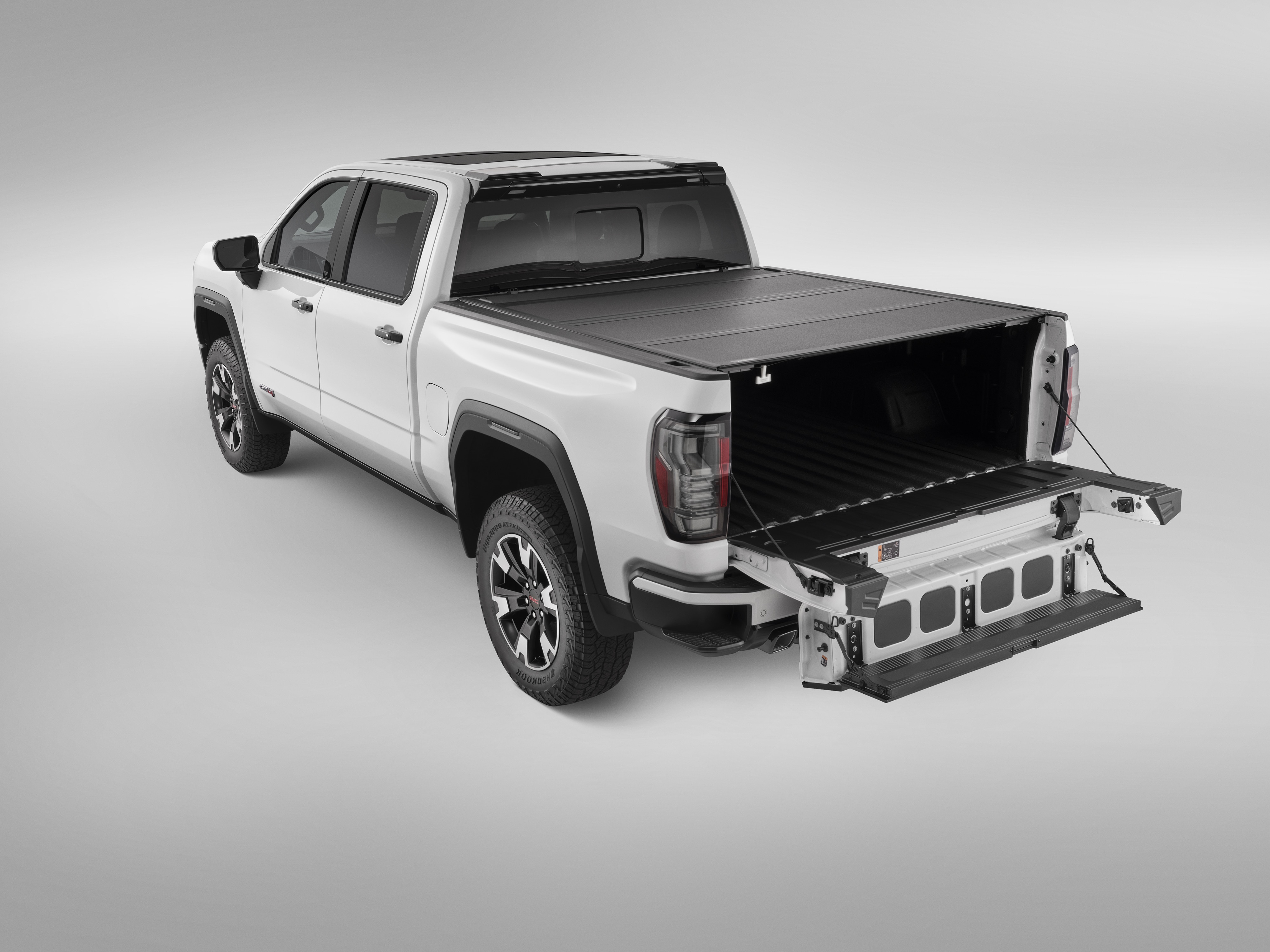 Standard Bed Hard Folding Truck Bed Cover in Matte Black by Advantage® - Associated Accessories