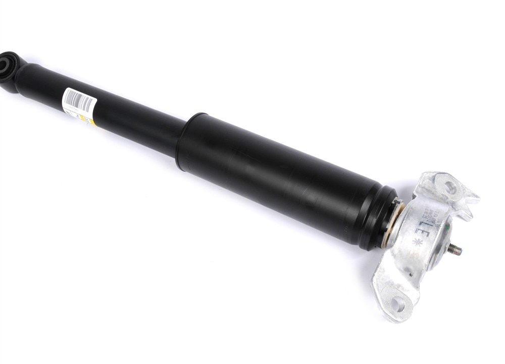 GM Genuine Parts Rear Driver Side Shock Absorber with Bumper, Upper Mount, and Nut
