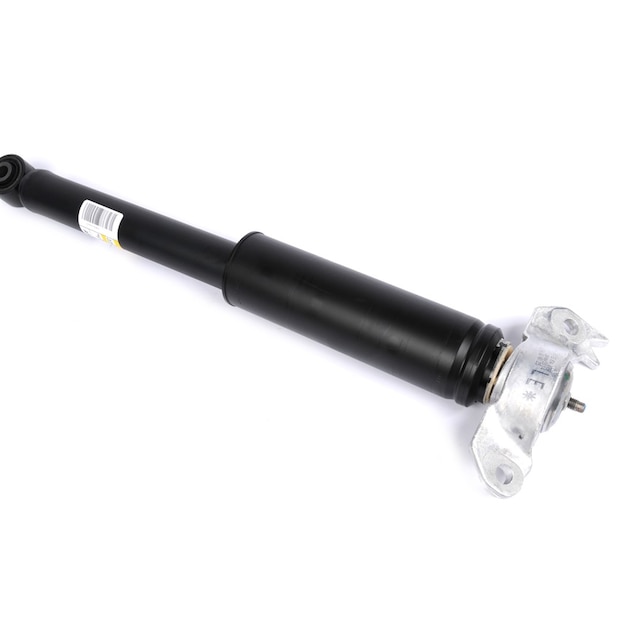GM Genuine Parts Rear Driver Side Shock Absorber with Bumper, Upper Mount, and Nut