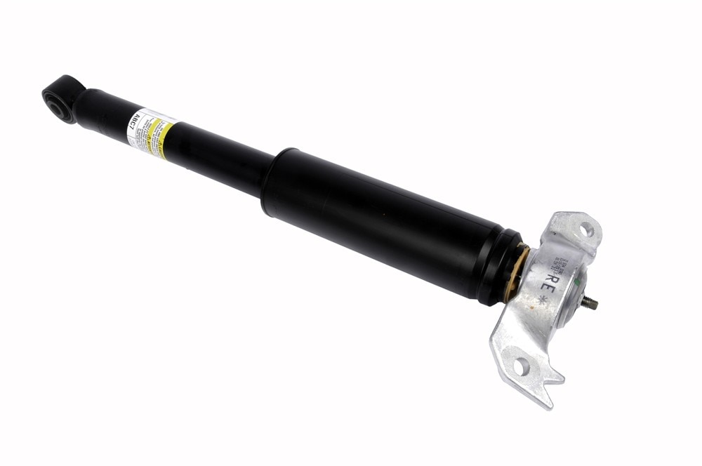 GM Genuine Parts Rear Passenger Side Shock Absorber with Bumper, Upper Mount, and Nut