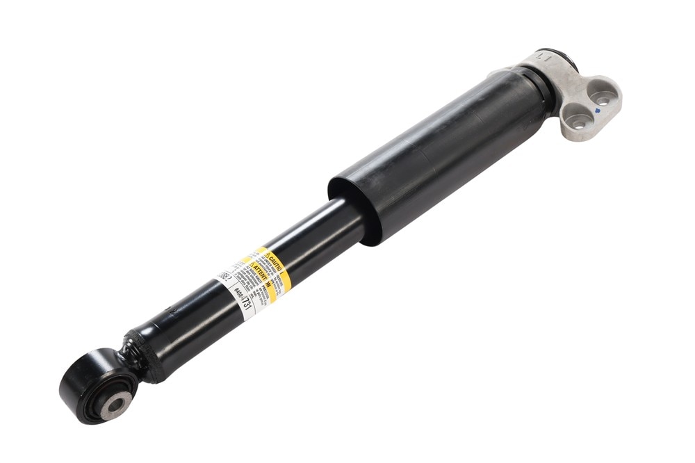 GM Genuine Parts Rear Driver Side Shock Absorber with Upper Mount