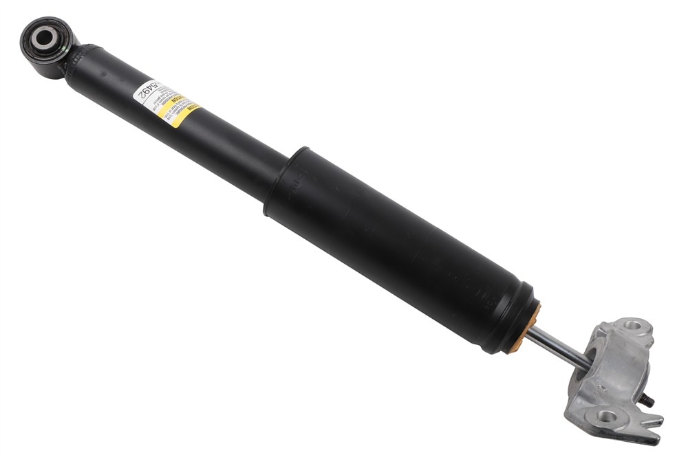 GM Genuine Parts Rear Driver Side Shock Absorber with Bumper, Upper Mount, and Nut