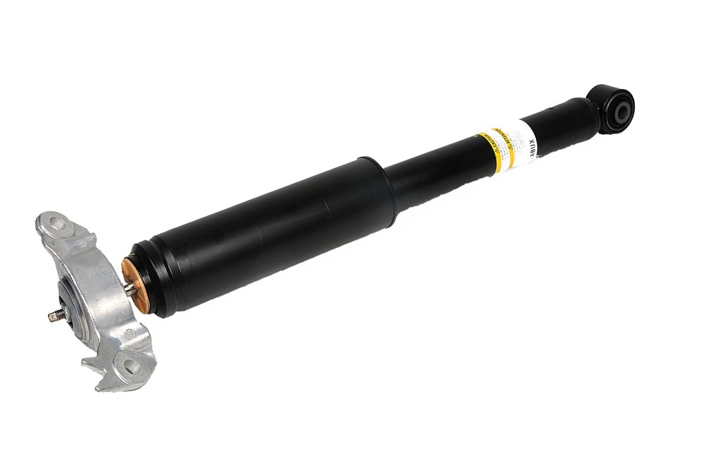 GM Genuine Parts Rear Passenger Side Shock Absorber with Bumper, Upper Mount, and Nut