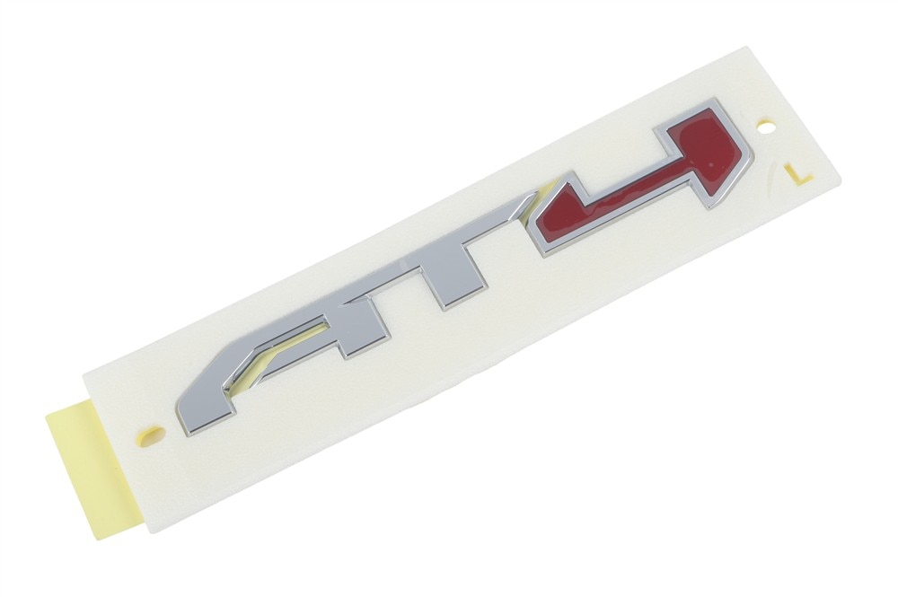 GM Genuine Parts Spike Front Driver Side Door Trim Level Name Plate