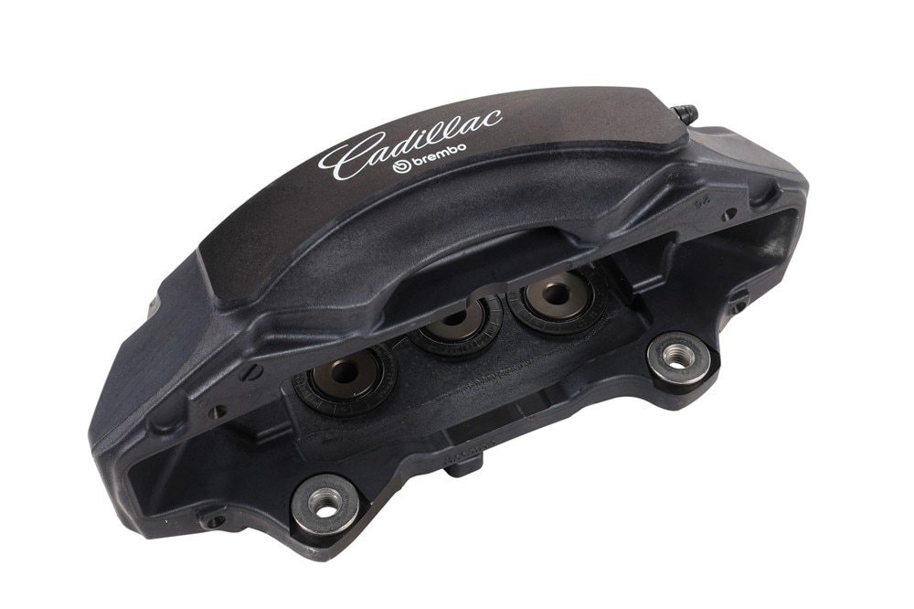 GM Genuine Parts Front Passengers Side Brake Pads and Caliper