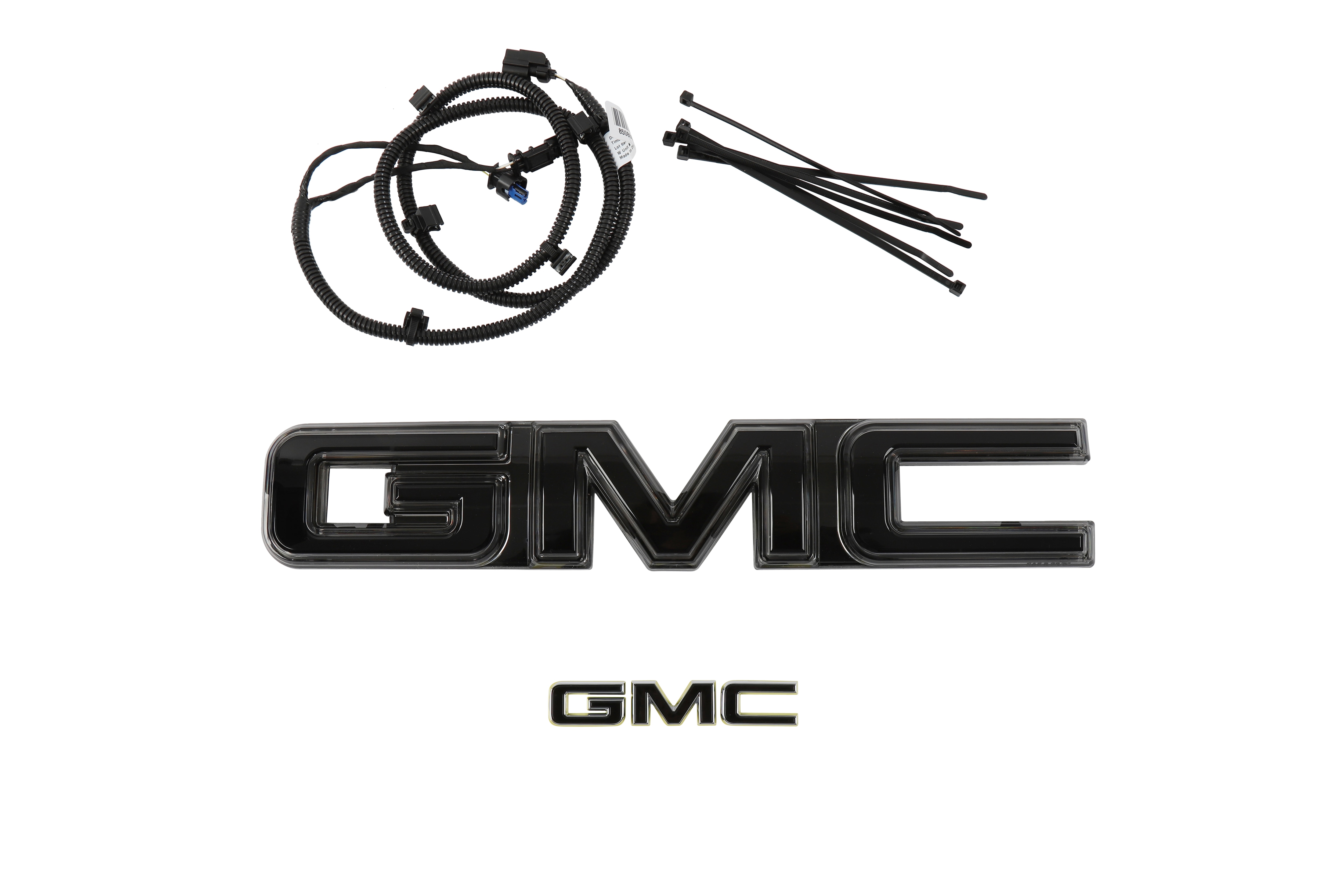 Front Illuminated and Rear Non-Illuminated GMC Emblems in Black