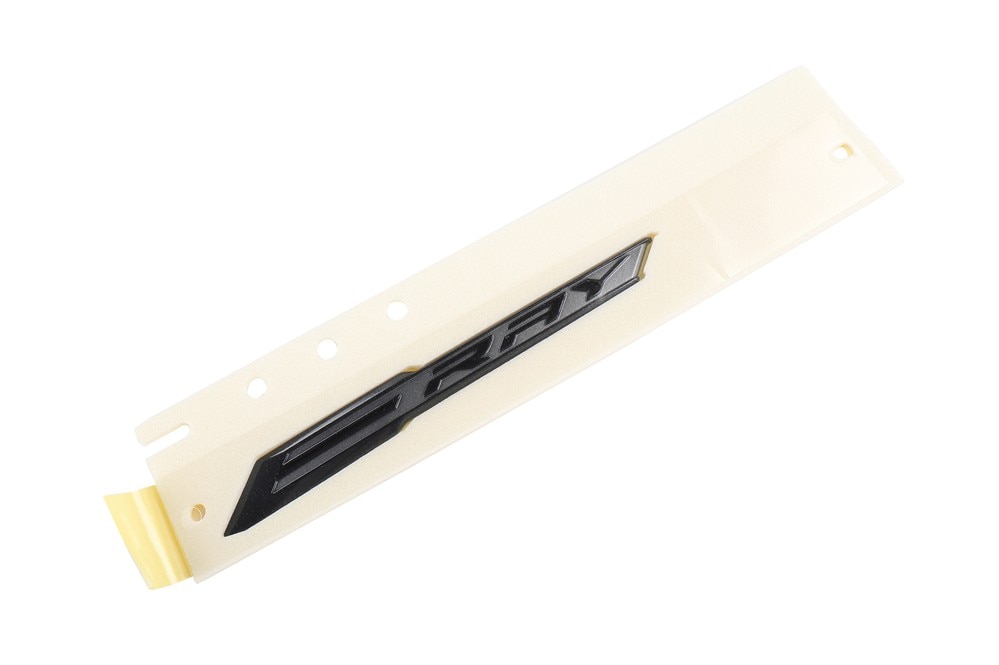 GM Genuine Parts Carbon Flash Metallic Body Driver Side Rear Marketing Package Name Plate
